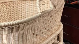 Rattan bassinet weaving.