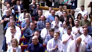 Zelenskiy addresses parliament under air-raid sirens