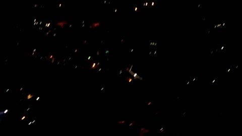 Cool firework display filmed from landing airplane