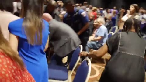 Heckler Shoved To Floor After Asking About Epstein Island At Hillary Event