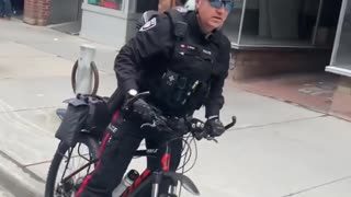 J. IRVING Ottawa Police Bully with a bicycle