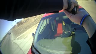 Bodycam shows Iowa police officer clinging to suspect's vehicle amid dramatic car chase