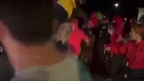 Clown Of A Woman Attempts To Talk Down Mob Destroying Her Car