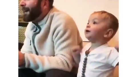 Ohh no dad! Wrong team. Funny child reaction 😃