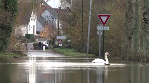 French residents helpless as floodwaters slowly recede