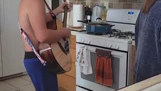 Richie Playing guitar for his mom