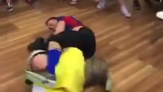 Man body slams two people