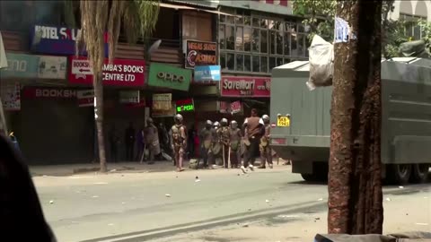 Men seen with handguns during Nairobi protests