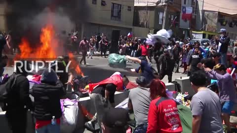 Chile: Protesters burn migrant camp belongings during mass anti-immigration protest in Iquique