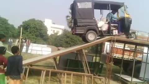 Amazing stunt with auto rickshaw in village