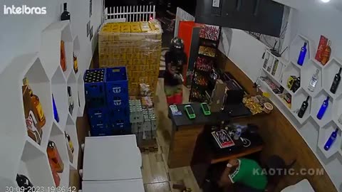 Store owner gets into gunfight with a hit man at point blank range💥🔫