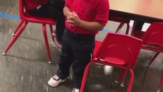 Little Boy Prays In Class