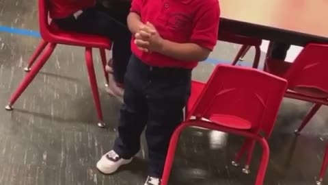 Little Boy Prays In Class