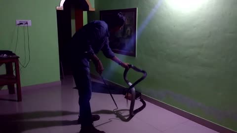 Dark black King Cobra found in the Room