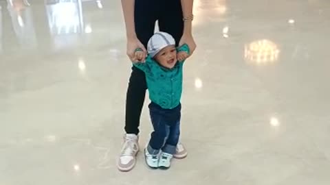 Cute baby with a beautiful Girl