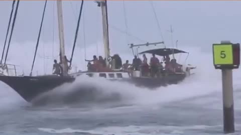 Surfin Schooner Safari - Sailboat Enters Pass With Following Sea / Breakers