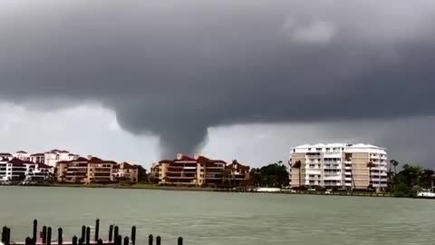 Huge Tornado Moves Across City During Storm