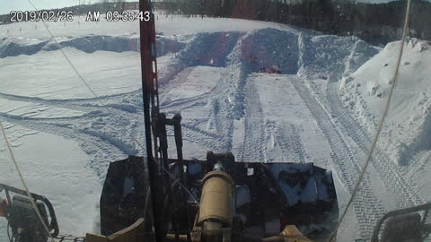 ski hill snow plowing
