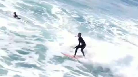 The guy's really good at surfing, it's cool,