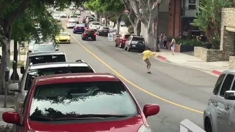 Skater hitches a ride