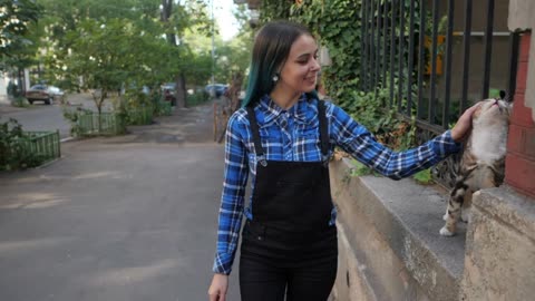 Young attractive punk girl smoking cigarette