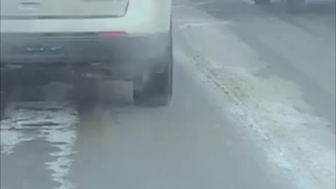 Motorist Launches Water Bottle in Traffic