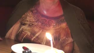 Sweet Grandma Has a Hard Time Blowing Out Candle