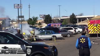 Burning Car in Parking Lot