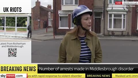 Moment Sky News reporter is approached by group of masked men