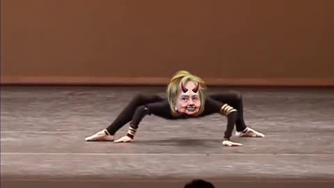 Hillary spider dancing to burn the witches.