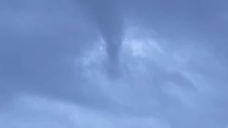 Tornado literally develops right before this person's eyes