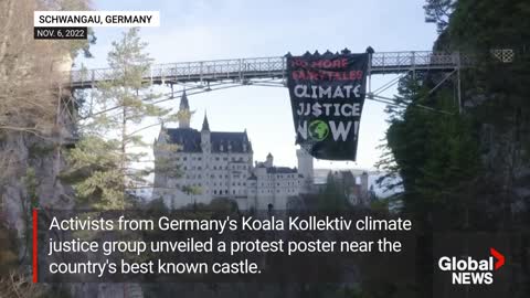 Drone shows climate activists' huge protest poster near German castle