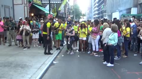 BRAZILIAN GIRL DANCES A BRAZILIAN SAMBA STREET DANCE AT BRAZILIAN CARNIVAL CULTURE PARTY NEW YORK