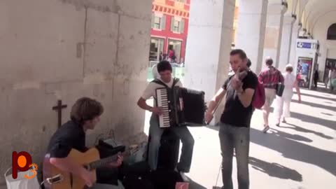 Street Musicians - Gypsy Jazz – A trio playing Tango by Astor Piazola called Libertango.