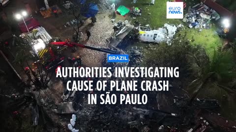 Families of Brazilian plane crash victims gather in Sao Paulo as experts work to identify the dead