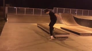 Black outfit skateboard rail fall