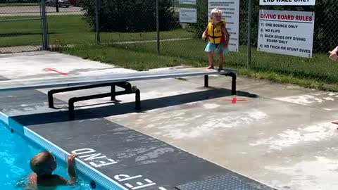 Brave Little Girl Practices Her Dives