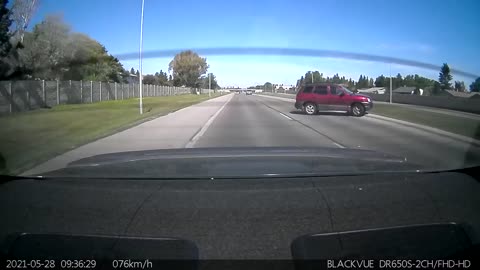 Distracted Driver Almost Accidentally Performs Pit Maneuver