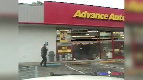 Police Dashcam Captures Truck Crashing Through Auto Parts Store