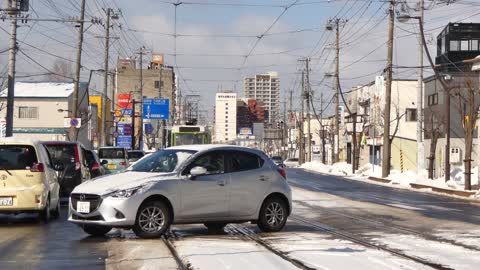 Hakodate Trams picking up passengers