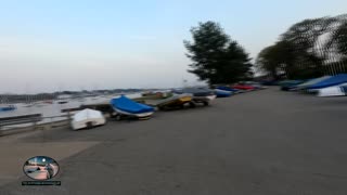 Relaxing by a riverside marina