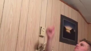 Girl in jean jacket jumps over and lands on bed