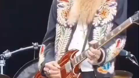 Nothing unusual just the bassist of ZZ Top performing on a 17-string bass guitar