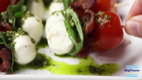 "Bacon-Kissed Caprese Skewers: A Pesto-Fueled Flavor Odyssey"