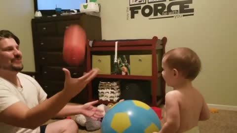 Super dad performs for laughing son