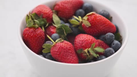 Strawberries Peels on Wooden Table