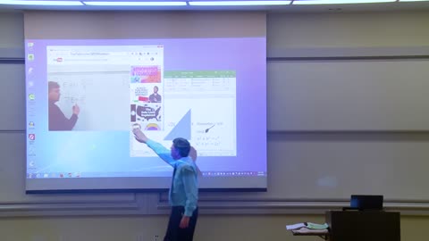 Math professor corrects projector screen