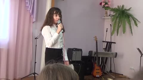 Dasha speaks at church video