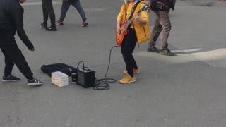 Street Performing Kid Shreds Classic 'Metallica' Song On Guitar