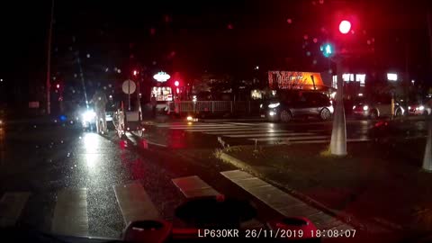 Cyclist Runs Red Light and Causes Traffic Chaos